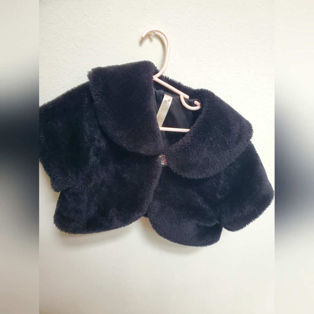 Black fluffy vest